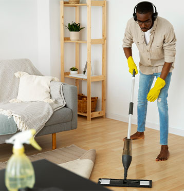 man cleaning floor